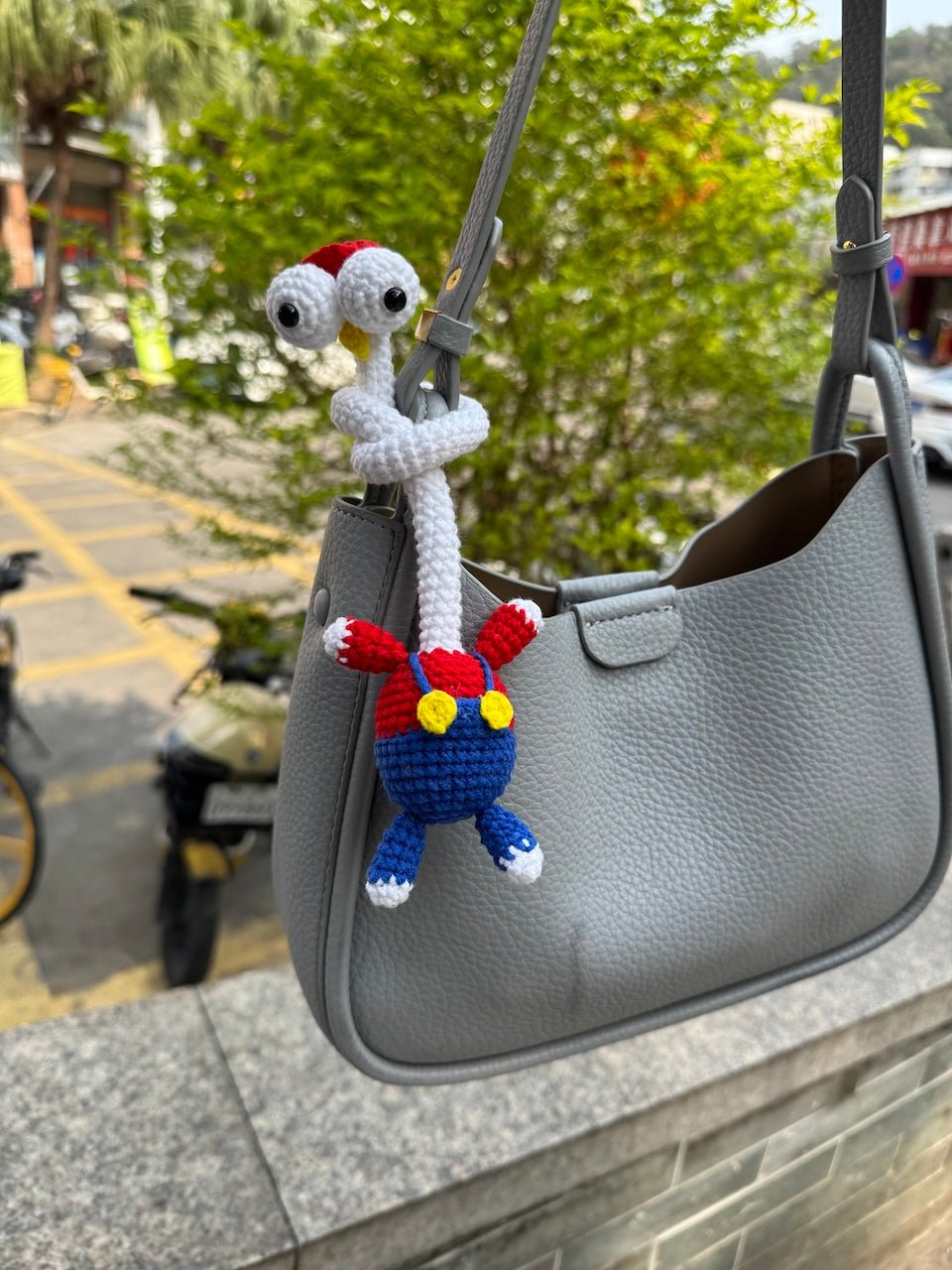 Handmade Crochet Mario Bird Rattle Toy Cute Backpack Charm for Kids and Bag Accessories - handmadeknit